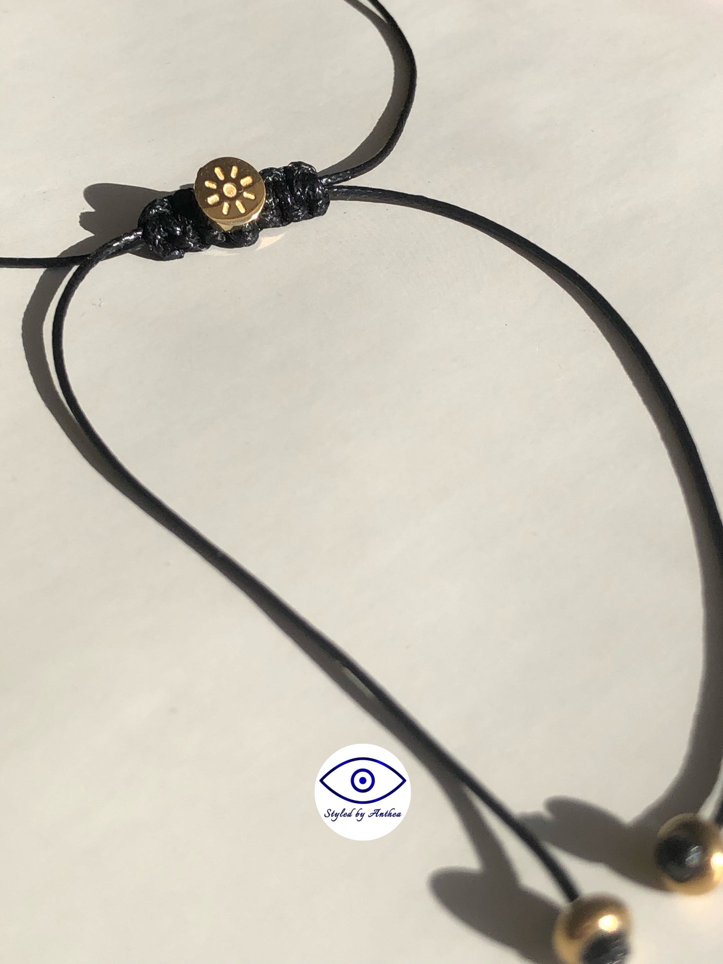 Adjustable Black Necklace - Sun Cyclo on Tassels