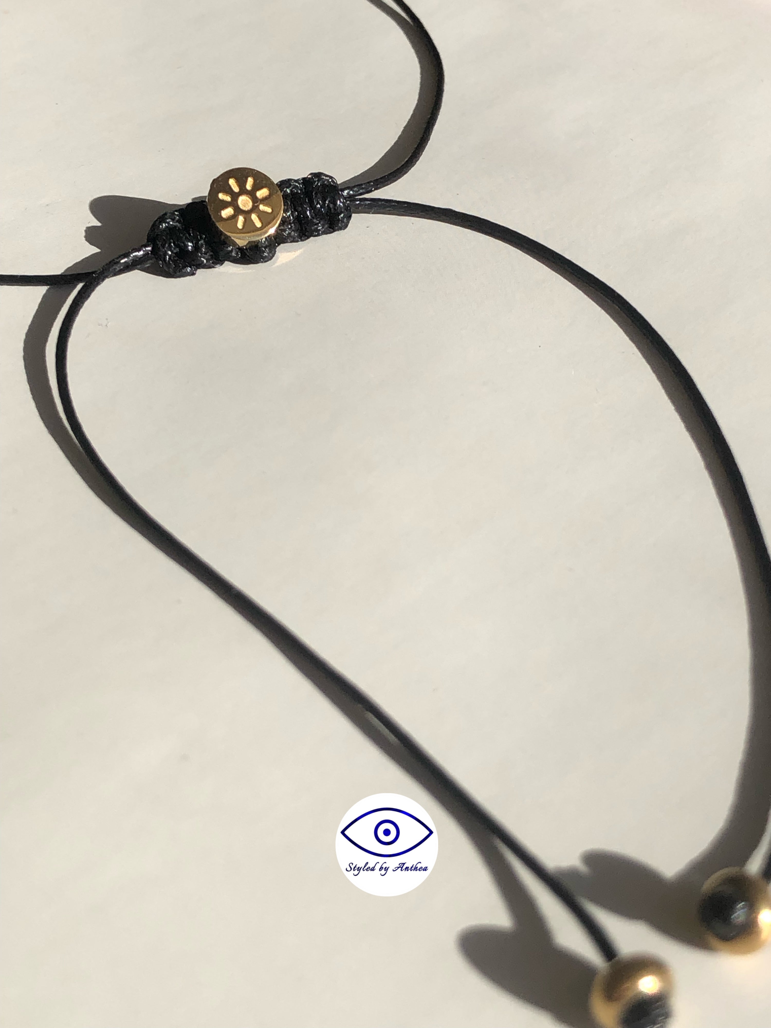 Adjustable Black Necklace - Sun Cyclo on Tassels
