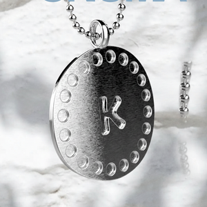 ONOMA K with Chain through Bail